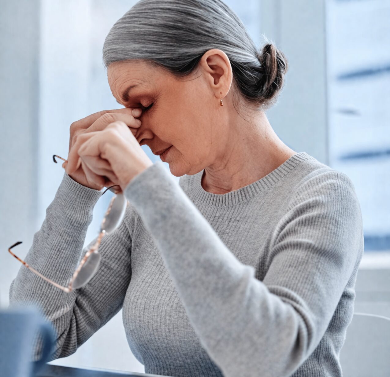 Woman pictured close on a desk